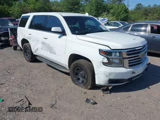 2020 Chevrolet Tahoe Commercial z VIN 1GNSKDEC7LR124772, wystawiony jako IAAI lot #42071547 z przebiegiem 129 154 mil mil oraz . Historia ofert i sprzedaży dostępna na DreamBid. Obrazek 1.