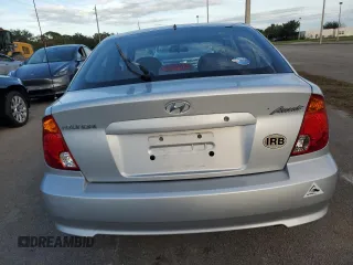 2004 Hyundai Accent GL with VIN KMHCG35C74U312579, listed as a Copart auction lot 75397884 with 0 mi miles and Salvage Title. Bid and sale history available at carsss.com. Image 6.