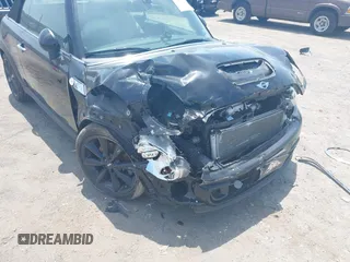 2013 MINI Convertible S with VIN WMWZP3C59DT550746, listed as a IAAI auction lot 39538986 with 59,934 mi miles and . Bid and sale history available at DreamBid. Image 6.