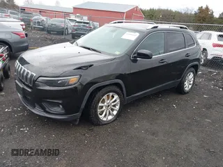 2019 Jeep Cherokee Latitude with VIN 1C4PJLCBXKD357403, listed as a IAAI auction lot 41606497 with 104,102 mi miles and . Bid and sale history available at carsss.com. Image 2.