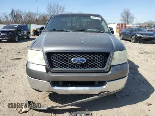 2004 Ford F-150 XLT with VIN 1FTRW12W14FA12948, listed as a Copart auction lot 48560795 with 266,969 mi miles and Salvage Title. Bid and sale history available at carsss.com. Image 5.