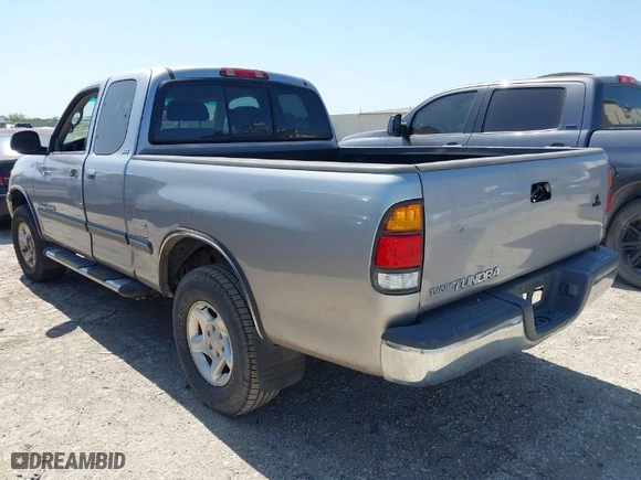 2002 Toyota Tundra SR5 with VIN 5TBRN34152S283145, listed as a IAAI auction lot 41976744 with 198,574 mi miles. Bid and sale history available at carsss.com. Image 3.