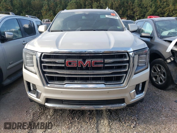 2021 GMC Yukon SLT with VIN 1GKS1BKDXMR435793, listed as a Copart auction lot 76443834 with 71,027 mi miles and Salvage Title. Bid and sale history available at carsss.com. Image 5.