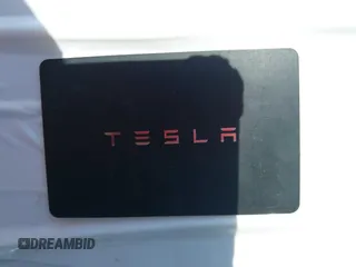 2024 Tesla Model Y with VIN 7SAYGDED8RF201955, listed as a IAAI auction lot 42700483 with 11,898 mi miles and . Bid and sale history available at DreamBid. Image 11.