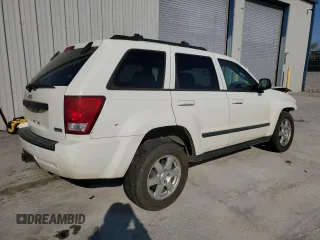 2009 Jeep Grand Cherokee Laredo with VIN 1J8HR48P89C532571, listed as a Copart auction lot 57309544 with 203,423 mi miles and Non Repairable. Bid and sale history available at carsss.com. Image 3.