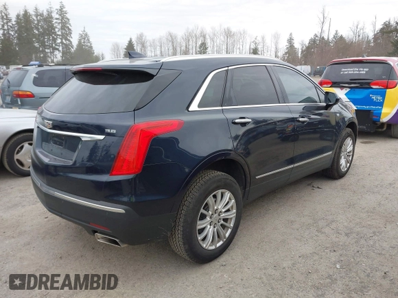 2017 Cadillac XT5 FWD with VIN 1GYKNARS2HZ188557, listed as a IAAI auction lot 41840764 with 104,524 mi miles. Bid and sale history available at carsss.com. Image 4.