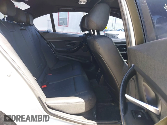 2018 BMW 3 Series 330i with VIN WBA8B9G52JNU57283, listed as a IAAI auction lot 42042507 with 51,740 mi miles and . Bid and sale history available at DreamBid. Image 8.