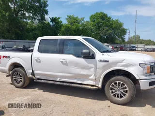 2020 Ford F-150 XL with VIN 1FTEW1E59LKE78957, listed as a IAAI auction lot 42021245 with 92,322 mi miles and . Bid and sale history available at DreamBid. Image 13.