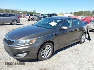 2013 Kia Optima LX with VIN 5XXGM4A77DG157034, listed as a IAAI auction lot 41870513 with 142,433 mi miles and . Bid and sale history available at carsss.com. Image 2.