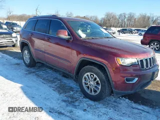 2018 Jeep Grand Cherokee Laredo E with VIN 1C4RJFAG8JC127274, listed as a IAAI auction lot 41394989 with 106,608 mi miles. Bid and sale history available at carsss.com. Image 1.