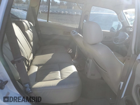 2003 Mitsubishi Montero z VIN JA4MT41RX3J013246, wystawiony jako Copart lot #42210545 z przebiegiem 188 387 mil mil oraz Szkoda całkowita • Salvage title. Historia ofert i sprzedaży dostępna na DreamBid. Obrazek 10.