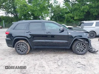 2020 Jeep Grand Cherokee Trailhawk with VIN 1C4RJFLG4LC387459, listed as a IAAI auction lot 42373820 with 55,492 mi miles and . Bid and sale history available at DreamBid. Image 13.