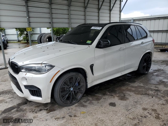 2015 BMW X5 M with VIN 5YMKT6C55F0C89468, listed as a Copart auction lot 75391074 with 0 mi miles and Salvage Title. Bid and sale history available at carsss.com. Image 1.