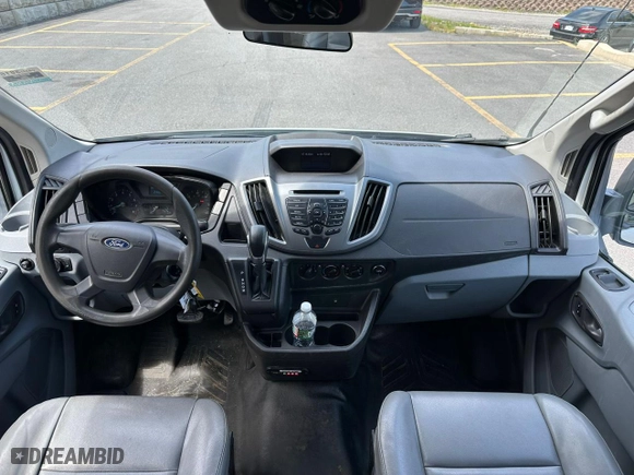 2015 Ford Transit Wagon XL with VIN 1FDZX2CM8FKB23583, listed as a Copart auction lot 64052914 with 244,695 mi miles and Clean Title. Bid and sale history available at carsss.com. Image 7.