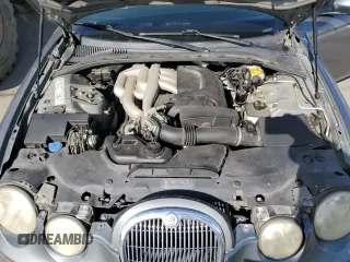 2005 Jaguar S-Type with VIN SAJWA01T15FN13800, listed as a Copart auction lot 53576305 with 182,533 mi miles and Salvage Title. Bid and sale history available at DreamBid. Image 11.