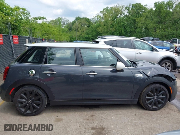 2019 MINI Hardtop 4 Door Cooper S z VIN WMWXU3C54K2H86856, wystawiony jako IAAI lot #42201474 z przebiegiem 56 610 mil mil oraz . Historia ofert i sprzedaży dostępna na DreamBid. Obrazek 13.