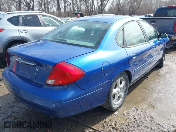 2003 Ford Taurus SE Standard with VIN 1FAFP53233G208763, listed as a IAAI auction lot 41661923 with 127,830 mi miles. Bid and sale history available at carsss.com. Image 4.