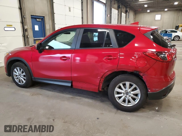 2016 Mazda CX-5 Touring z VIN JM3KE4CY7G0898598, wystawiony jako Copart lot #56717895 z przebiegiem 103 548 mil mil oraz Szkoda całkowita • Salvage title. Historia ofert i sprzedaży dostępna na DreamBid. Obrazek 2.