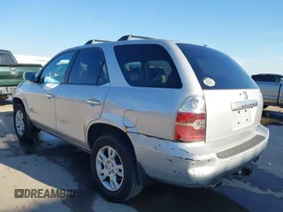 2004 Acura MDX Touring Pkg w/Navigation with VIN 2HNYD18804H546977, listed as a IAAI auction lot 41345964 with 161,856 mi miles. Bid and sale history available at carsss.com. Image 3.