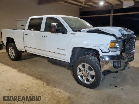 2018 GMC Sierra 2500HD SLT with VIN 1GT12TEY7JF279153, listed as a Copart auction lot 87697105 with 121,082 mi miles and Salvage Title. Bid and sale history available at carsss.com. Image 4.