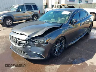 2016 Mazda 6 i Grand Touring with VIN JM1GJ1W57G1479543, listed as a IAAI auction lot 41371653 with 83,741 mi miles and . Bid and sale history available at carsss.com. Image 6.