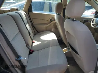 2004 Ford Focus ZTW with VIN 1FAFP35Z84W203676, listed as a Copart auction lot 57272835 with 183,115 mi miles and Salvage title. Bid and sale history available at DreamBid. Image 10.