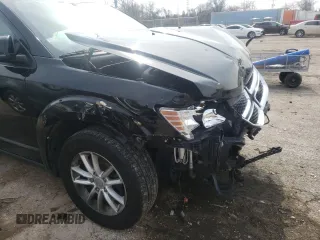2017 Dodge Journey SXT with VIN 3C4PDDBG8HT520725, listed as a Copart auction lot 38070542 with 103,325 mi miles and Salvage title. Bid and sale history available at DreamBid. Image 9.