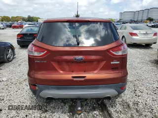 2014 Ford Escape SE with VIN 1FMCU0GX9EUD77491, listed as a Copart auction lot 51484745 with 90,511 mi miles and Clean Title. Bid and sale history available at DreamBid. Image 6.