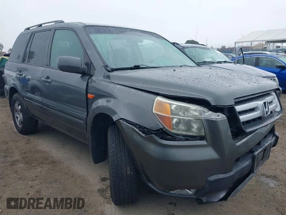 2007 Honda Pilot EX with VIN 2HKYF18497H500458, listed as a IAAI auction lot 41784273 with 114,454 mi miles. Bid and sale history available at carsss.com. Image 1.