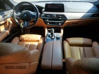 2020 BMW 5 Series M550i xDrive with VIN WBAJS7C0XLBN96338, listed as a Copart auction lot 60591815 with 73,910 mi miles and Salvage title. Bid and sale history available at DreamBid. Image 8.