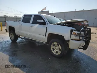 2018 Chevrolet Silverado 1500 LT with VIN 3GCUKREC0JG596842, listed as a Copart auction lot 47394105 with 135,583 mi miles and Salvage Title. Bid and sale history available at carsss.com. Image 4.