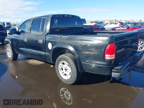 2003 Dodge Dakota Sport with VIN 1D7HL38X53S381338, listed as a IAAI auction lot 38840426 with 130,846 mi miles. Bid and sale history available at carsss.com. Image 3.