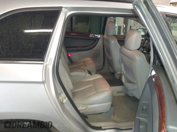 2007 Chrysler Pacifica Touring with VIN 2A8GM68XX7R140279, listed as a IAAI auction lot 41842527 with 135,721 mi miles. Bid and sale history available at carsss.com. Image 8.