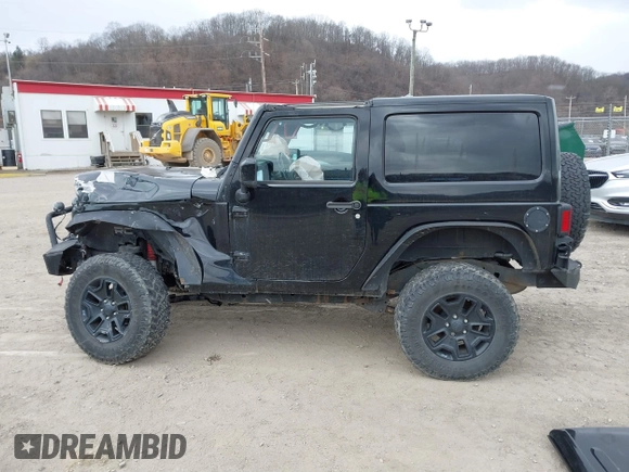 2014 Jeep Wrangler Sahara with VIN 1C4AJWBG9EL311477, listed as a IAAI auction lot 41884255 with 82,221 mi miles and . Bid and sale history available at carsss.com. Image 15.