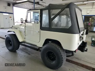 1974 Toyota Land Cruiser z VIN FJ40178981, wystawiony jako Copart lot #74798404 z przebiegiem 31 601 mil mil oraz Czysty tytuł • Clean title. Historia ofert i sprzedaży dostępna na DreamBid. Obrazek 2.