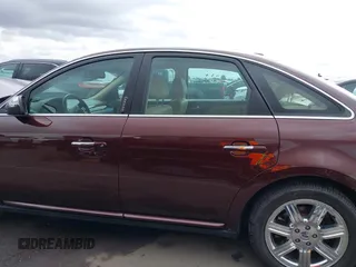 2009 Ford Taurus Limited z VIN 1FAHP25W59G115291, wystawiony jako IAAI lot #42195549 z przebiegiem 58 983 mil mil oraz . Historia ofert i sprzedaży dostępna na DreamBid. Obrazek 15.