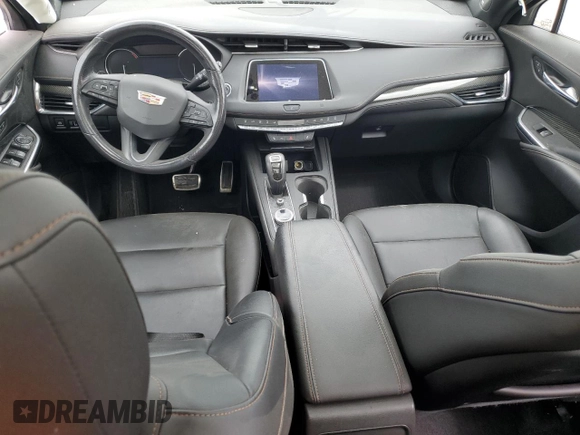 2019 Cadillac XT4 FWD Sport z VIN 1GYFZER48KF112347, wystawiony jako Copart lot #51124995 z przebiegiem 60 811 mil mil oraz Szkoda całkowita • Salvage title. Historia ofert i sprzedaży dostępna na DreamBid. Obrazek 8.