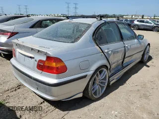 2004 BMW 3 Series 325xi with VIN WBAEU33404PM60151, listed as a Copart auction lot 57120235 with 116,859 mi miles and Salvage title. Bid and sale history available at DreamBid. Image 3.