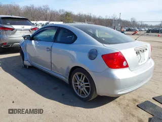 2005 Scion tC with VIN JTKDE177050043393, listed as a IAAI auction lot 41762368 with 170,244 mi miles. Bid and sale history available at carsss.com. Image 3.