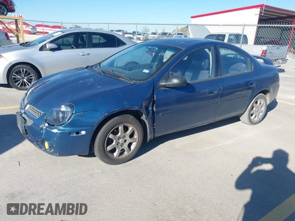 2003 Dodge Neon SXT with VIN 1B3ES56C43D150870, listed as a IAAI auction lot 41478965 with 219,292 mi miles. Bid and sale history available at carsss.com. Image 2.