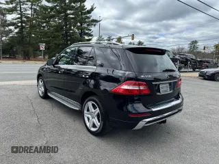 2014 Mercedes-Benz M 550 with VIN 4JGDA7DB5EA423124, listed as a Copart auction lot 53713385 with 215,650 mi miles and Clean Title. Bid and sale history available at carsss.com. Image 4.