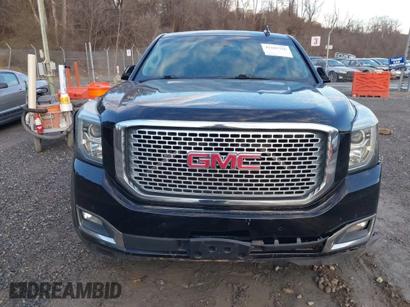 2016 GMC Yukon Denali with VIN 1GKS2CKJ2GR412201, listed as a IAAI auction lot 41185716 with 124,421 mi miles. Bid and sale history available at carsss.com. Image 12.