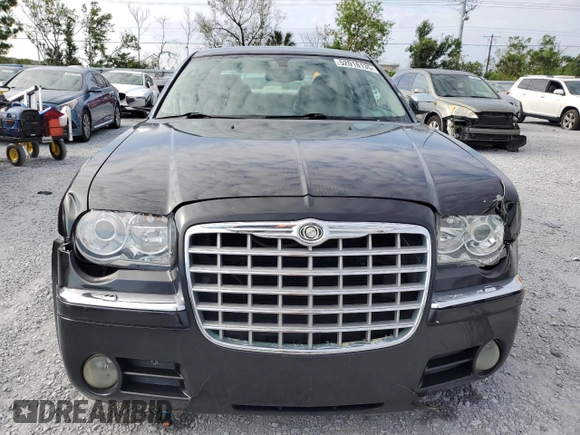 2005 Chrysler 300 C with VIN 2C3AA63H15H525775, listed as a Copart auction lot 52018135 with 59,098 mi miles and Salvage Title. Bid and sale history available at DreamBid. Image 5.