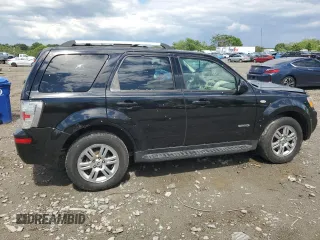 2008 Mercury Mariner Premier z VIN 4M2CU97128KJ17304, wystawiony jako Copart lot #55965555 z przebiegiem 134 473 mil mil oraz Szkoda całkowita • Salvage title. Historia ofert i sprzedaży dostępna na DreamBid. Obrazek 3.