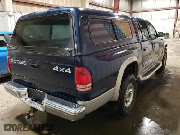 2000 Dodge Dakota Sport with VIN 1B7GG2AN2YS727589, listed as a Copart auction lot 52873305 with 105,894 mi miles and Salvage Title. Bid and sale history available at carsss.com. Image 3.