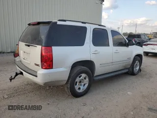 2012 GMC Yukon SLT with VIN 1GKS1CE03CR287810, listed as a Copart auction lot 73743304 with 206,122 mi miles and Salvage Title. Bid and sale history available at carsss.com. Image 3.