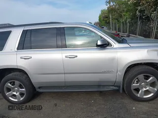 2019 Chevrolet Tahoe LT with VIN 1GNSCBKCXKR219413, listed as a IAAI auction lot 42013260 with 92,886 mi miles and . Bid and sale history available at DreamBid. Image 14.