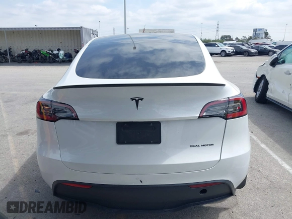 2023 Tesla Model Y Long Range with VIN 7SAYGDEE9PA026005, listed as a IAAI auction lot 41895223 with 43,813 mi miles and . Bid and sale history available at DreamBid. Image 16.