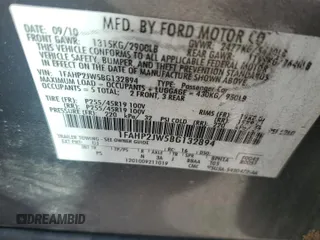 2011 Ford Taurus Limited с VIN 1FAHP2JW5BG132894, выставлен на аукционе Copart как лот 46996815 с пробегом 76 980 миль миль и Списание • Salvage title. История ставок и продаж доступна на DreamBid. Изображение 14.