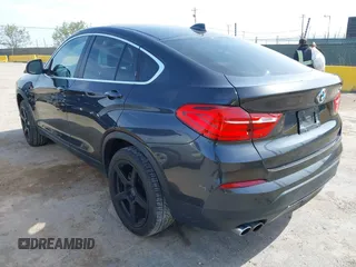 2015 BMW X4 xDrive28i z VIN 5UXXW3C54F0M87412, wystawiony jako IAAI lot #42038938 z przebiegiem 106 461 mil mil oraz . Historia ofert i sprzedaży dostępna na DreamBid. Obrazek 3.